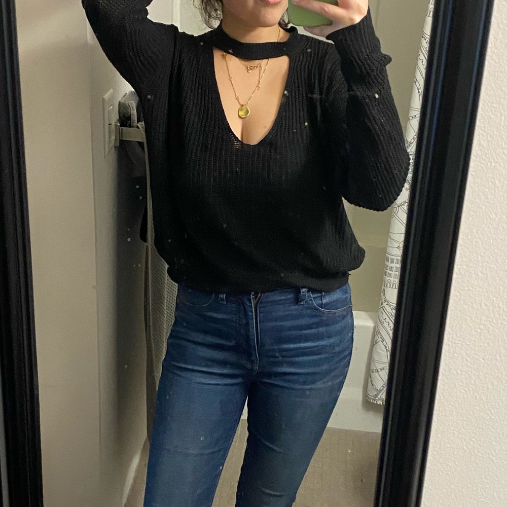 Long sleeve black sweater with v neck cut out